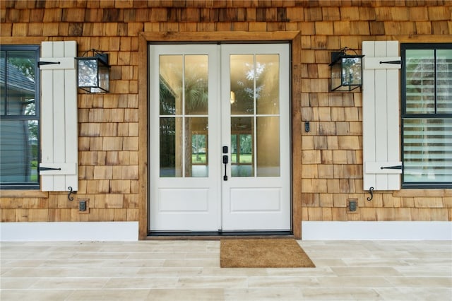 doorway to property featuring french doors