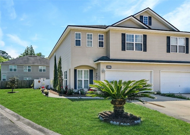 227 Callie Cir, Brunswick, GA 31523 - view of front of home with a garage and a front lawn
