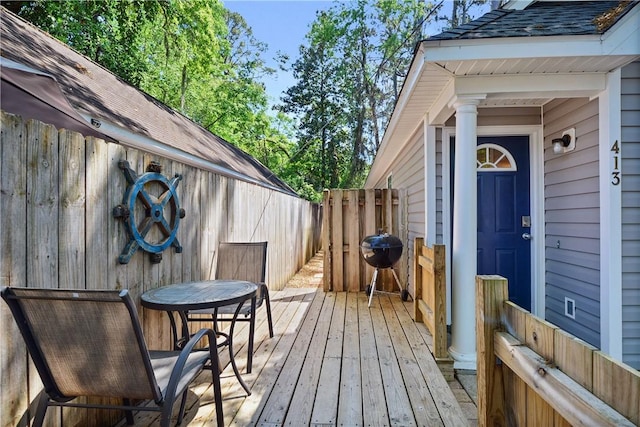 wooden deck featuring area for grilling