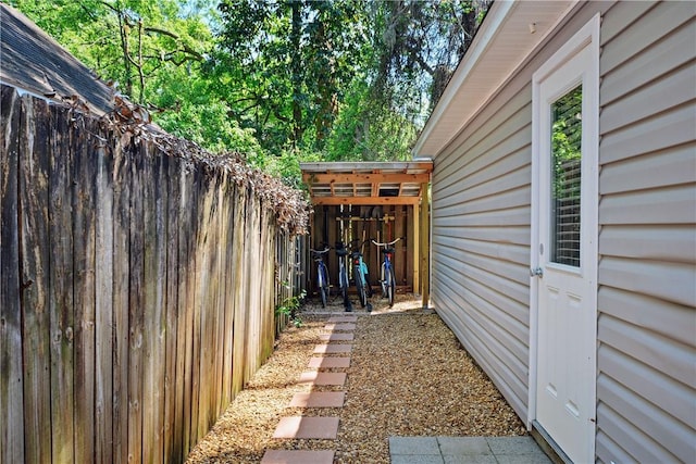 view of home's exterior featuring fence