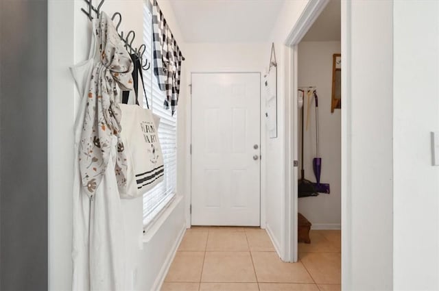 doorway featuring light tile patterned floors