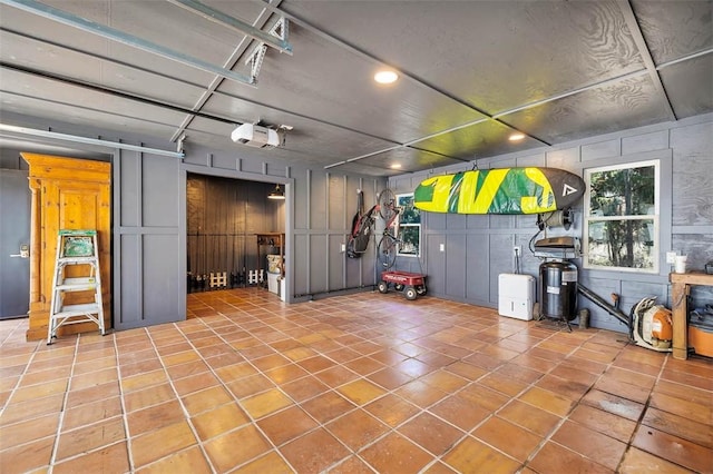 interior space featuring a garage and recessed lighting