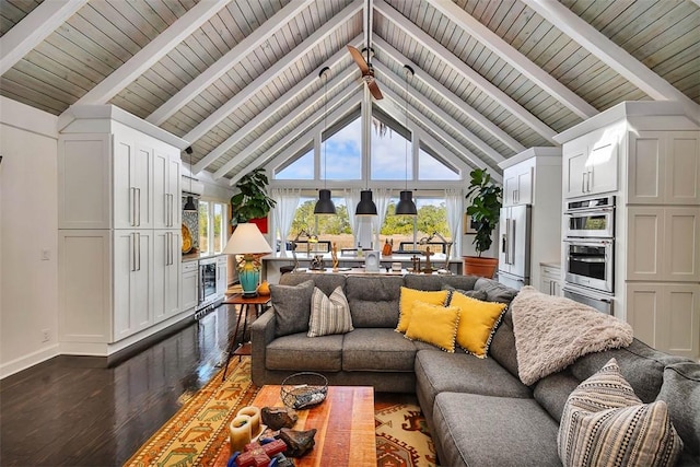 living room with high vaulted ceiling, wood finished floors, and beam ceiling