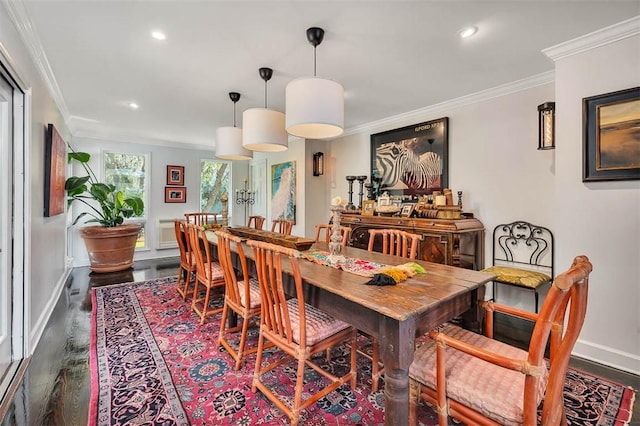 dining area featuring recessed lighting, baseboards, crown molding, and wood finished floors