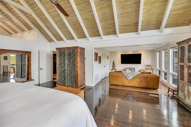 bedroom with wooden ceiling, wood finished floors, beam ceiling, and access to exterior