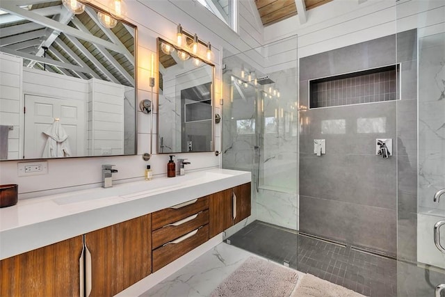 bathroom featuring vaulted ceiling with beams, marble finish floor, an enclosed shower, and vanity