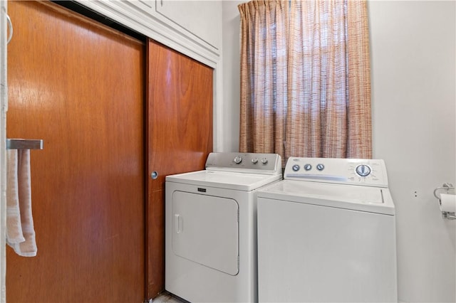 laundry area featuring independent washer and dryer