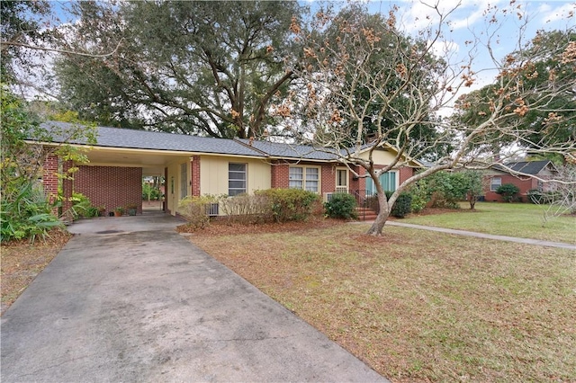 single story home featuring a front yard and a carport