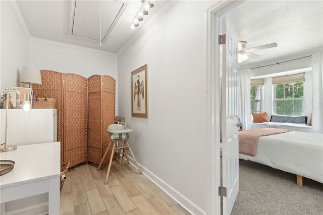 501 W Hall St, Saint Marys, GA 31558 - bathroom featuring wood finished floors, a ceiling fan, and ornamental molding