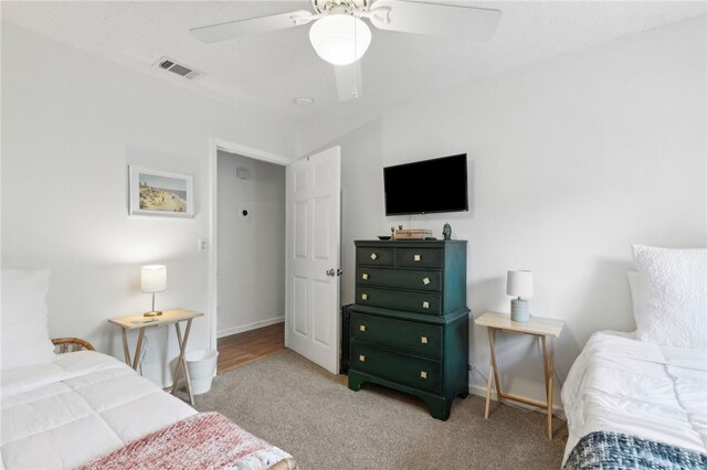 501 W Hall St, Saint Marys, GA 31558 - bedroom featuring baseboards, visible vents, a ceiling fan, and light colored carpet