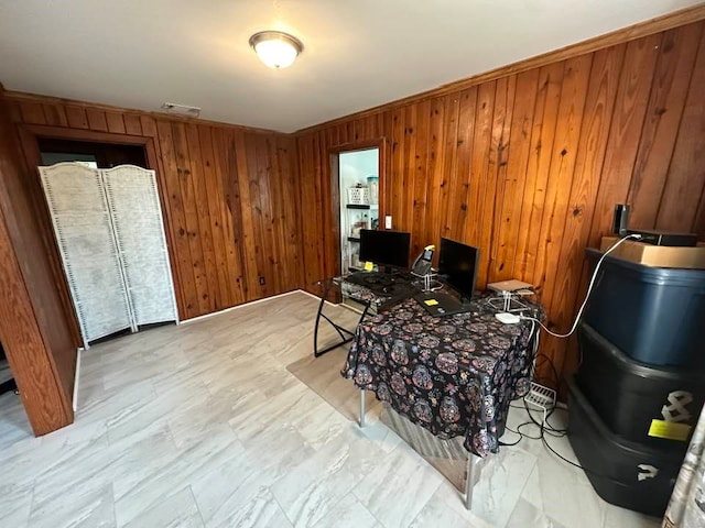 office area featuring wooden walls