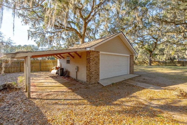 detached garage with fence