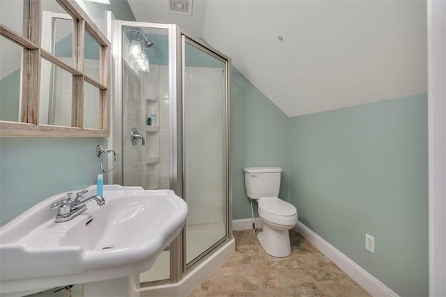 full bathroom featuring lofted ceiling, toilet, visible vents, baseboards, and a shower stall