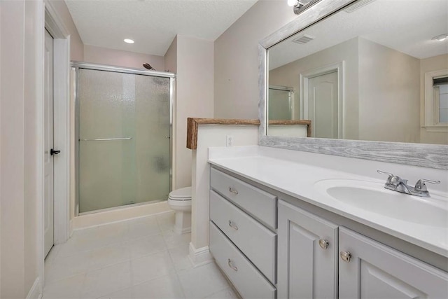 full bath with toilet, a stall shower, and vanity