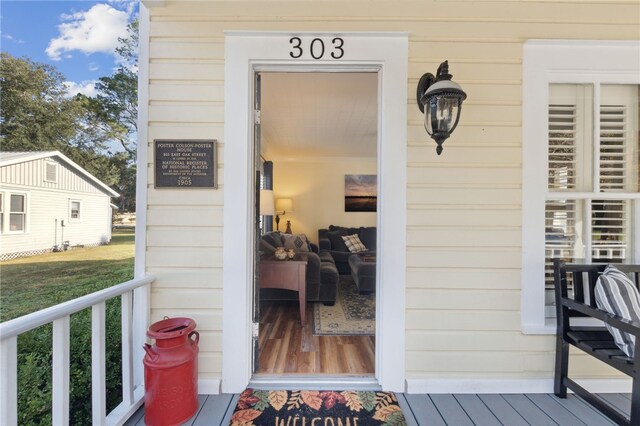 doorway to property with a porch