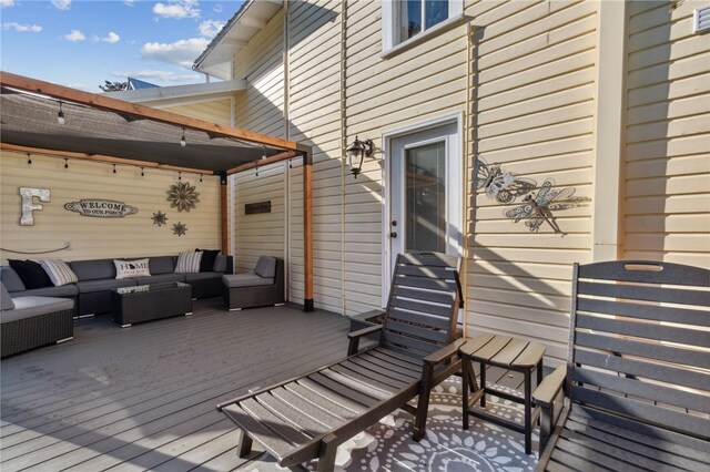 deck featuring an outdoor living space