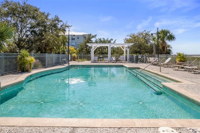 view of pool featuring a pergola and a patio