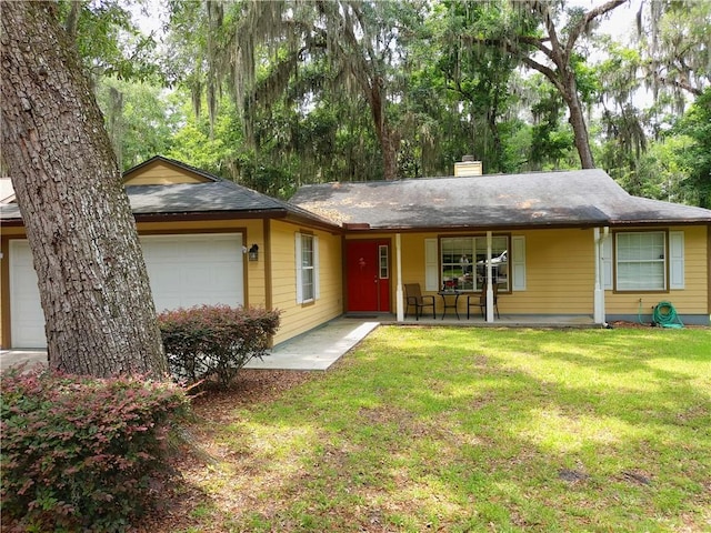 ranch-style house with a front lawn, a porch, and a garage