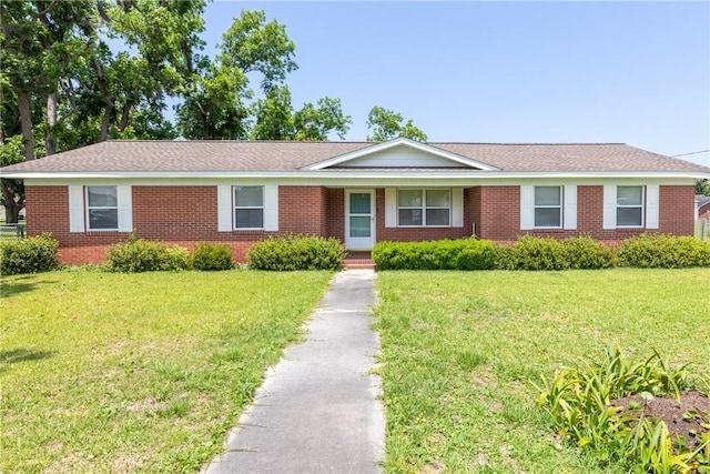 2320 Ben Hill Ave, Waycross, GA 31501 - single story home featuring a front yard and brick siding