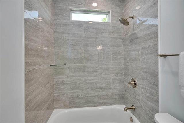full bathroom featuring toilet and bathtub / shower combination