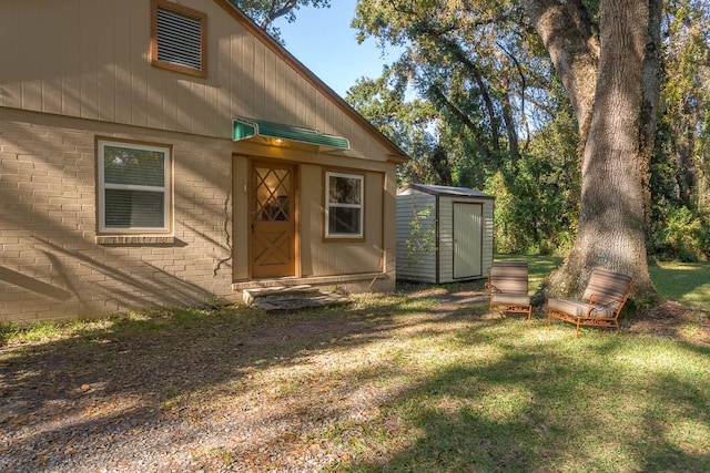 view of outbuilding with a yard