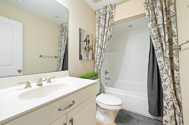 bathroom featuring toilet, shower / bath combination with curtain, and vanity