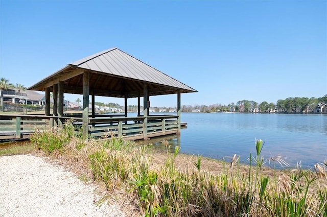 dock area with a water view and a gazebo