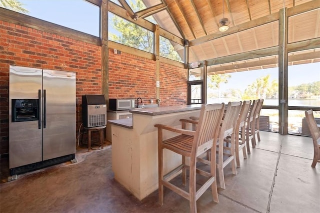 view of patio featuring outdoor wet bar