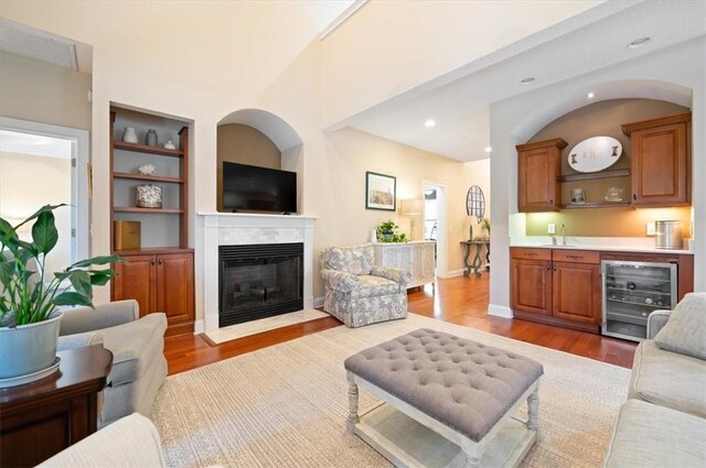 kitchen with sink, decorative backsplash, and black appliances