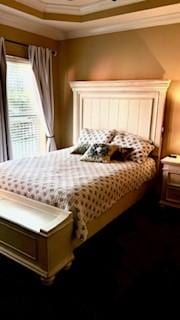 bedroom with ornamental molding