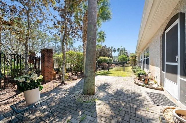 view of patio featuring fence