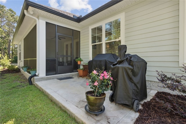 entrance to property featuring a patio