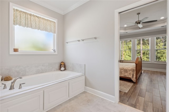 bathroom featuring hardwood / wood-style flooring, ceiling fan, a bath, and crown molding