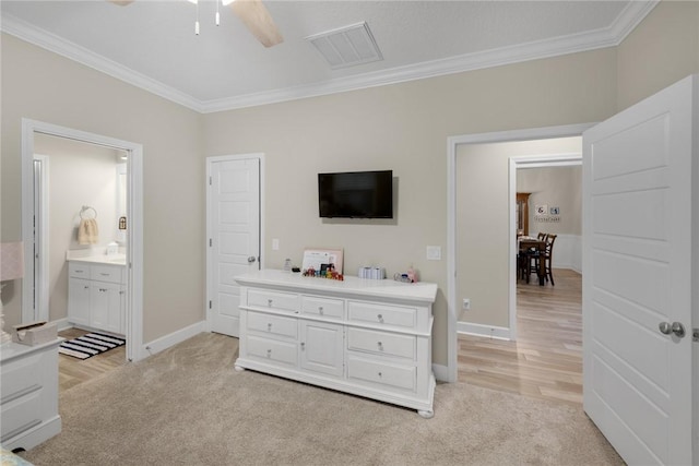 373 Harbour Island Cir, Waverly, GA 31565 - bedroom with crown molding, light carpet, and connected bathroom