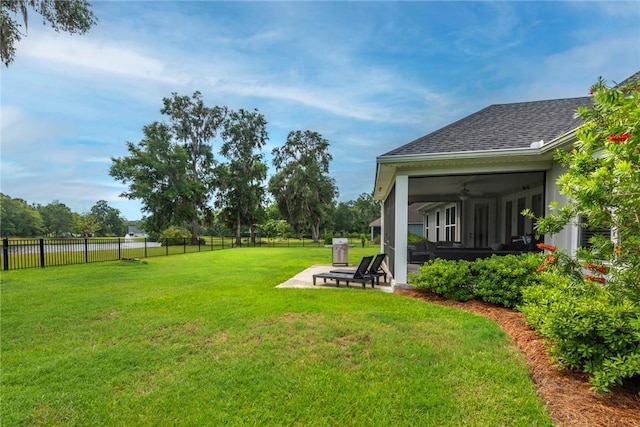 373 Harbour Island Cir, Waverly, GA 31565 - view of yard featuring ceiling fan, a sunroom, and a patio