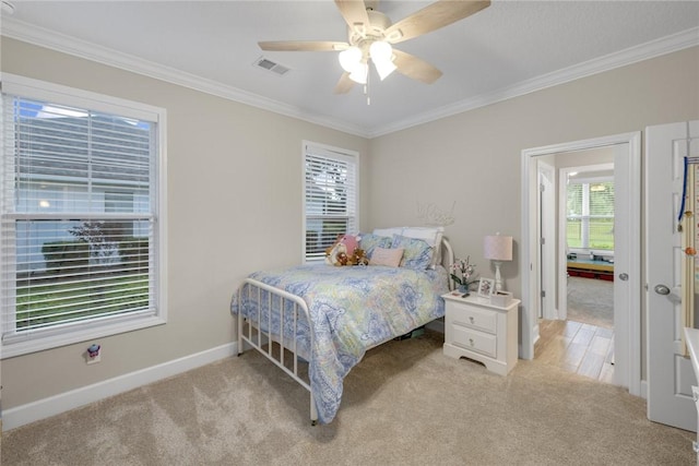373 Harbour Island Cir, Waverly, GA 31565 - bedroom with light colored carpet, ornamental molding, and ceiling fan