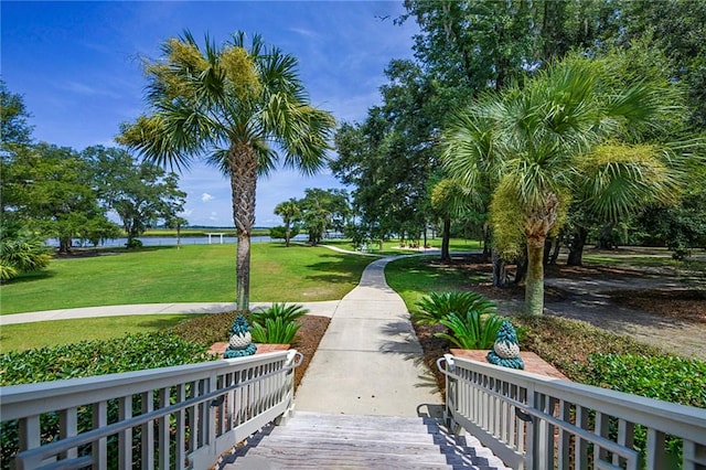 373 Harbour Island Cir, Waverly, GA 31565 - surrounding community with a water view and a lawn