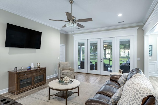 373 Harbour Island Cir, Waverly, GA 31565 - living room with wood finished floors, a ceiling fan, ornamental molding, french doors, and recessed lighting