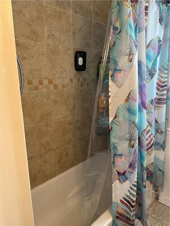 bathroom with shower / tub combo with curtain