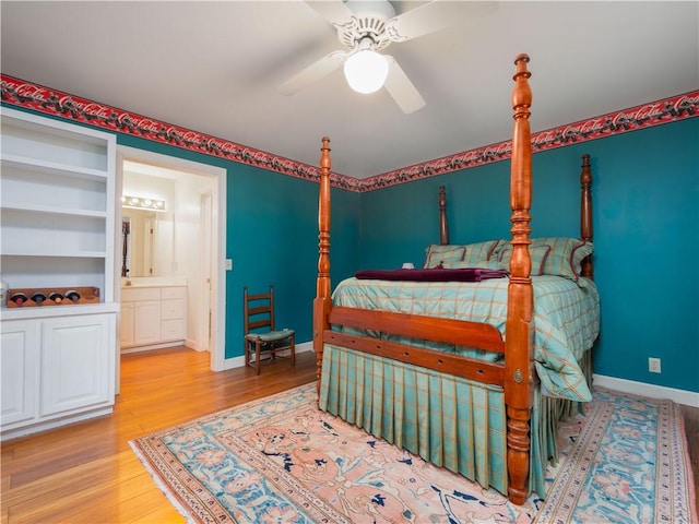 bedroom featuring baseboards, light wood finished floors, and ceiling fan