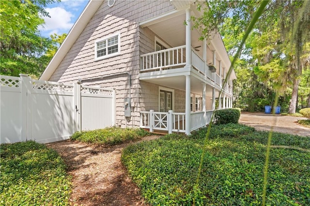 701 Third Ave, Saint Simons Island, GA 31522 - view of home's exterior with fence and a balcony