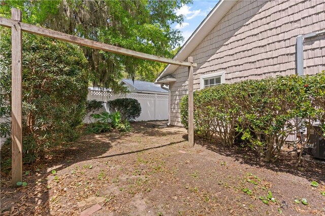 701 Third Ave, Saint Simons Island, GA 31522 - view of yard featuring fence