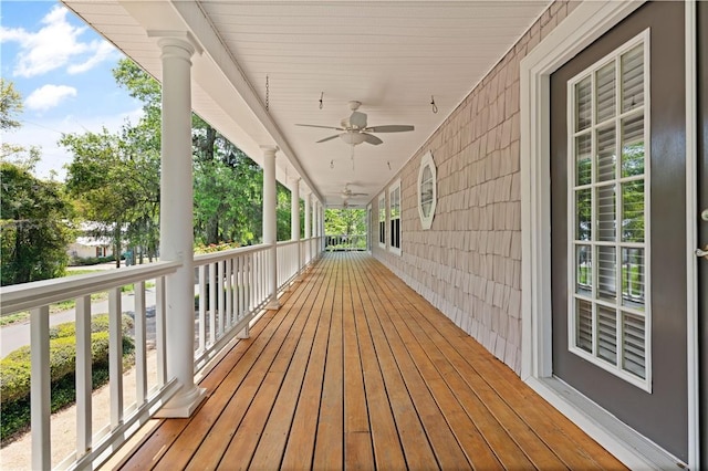 701 Third Ave, Saint Simons Island, GA 31522 - deck featuring covered porch and ceiling fan