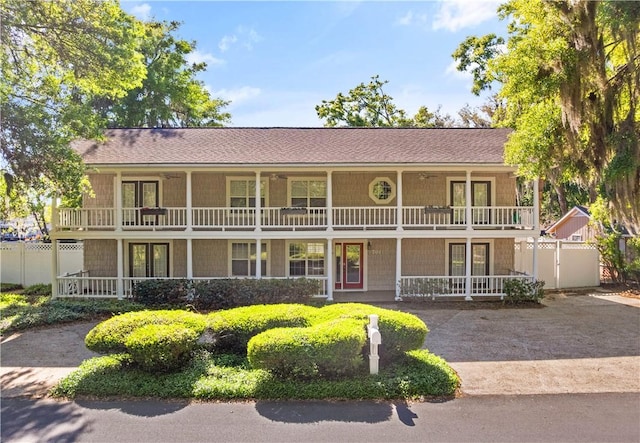 701 Third Ave, Saint Simons Island, GA 31522 - exterior space featuring a balcony, a porch, and fence