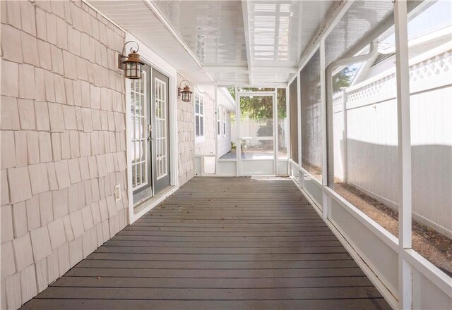 701 Third Ave, Saint Simons Island, GA 31522 - unfurnished sunroom with french doors