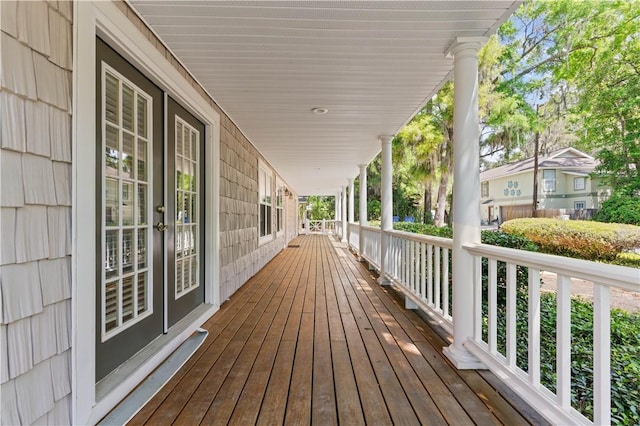 701 Third Ave, Saint Simons Island, GA 31522 - wooden deck featuring covered porch and french doors