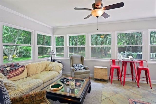 104 Cay Trce, Brunswick, GA 31525 - sunroom featuring healthy amount of natural light, crown molding, and baseboards