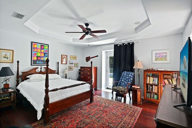 104 Cay Trce, Brunswick, GA 31525 - bedroom with a tray ceiling, wood finished floors, and a ceiling fan