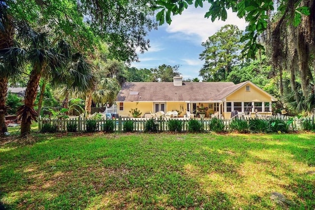 104 Cay Trce, Brunswick, GA 31525 - back of property with a chimney