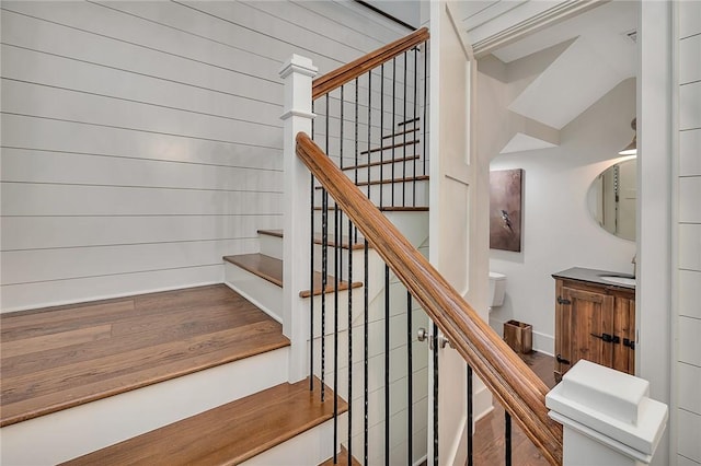 11826 Old Demere Rd, Saint Simons Island, GA 31522 - stairway featuring wood finished floors
